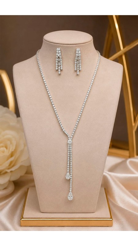 COLLAR MAS ARETES TONO PLATEADO EN FORMA REDONDA