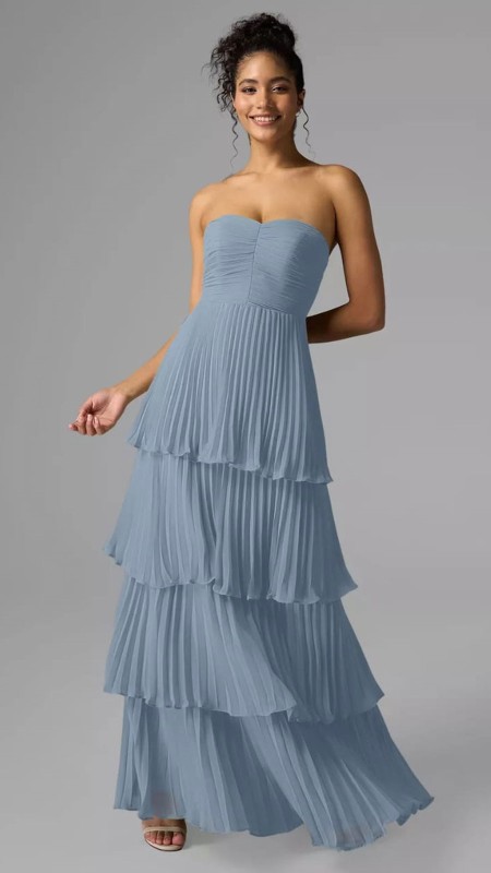 VESTIDO CELESTE CON CAPAS PLISADO