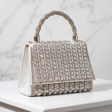 CARTERA PLATEADA DE MANO